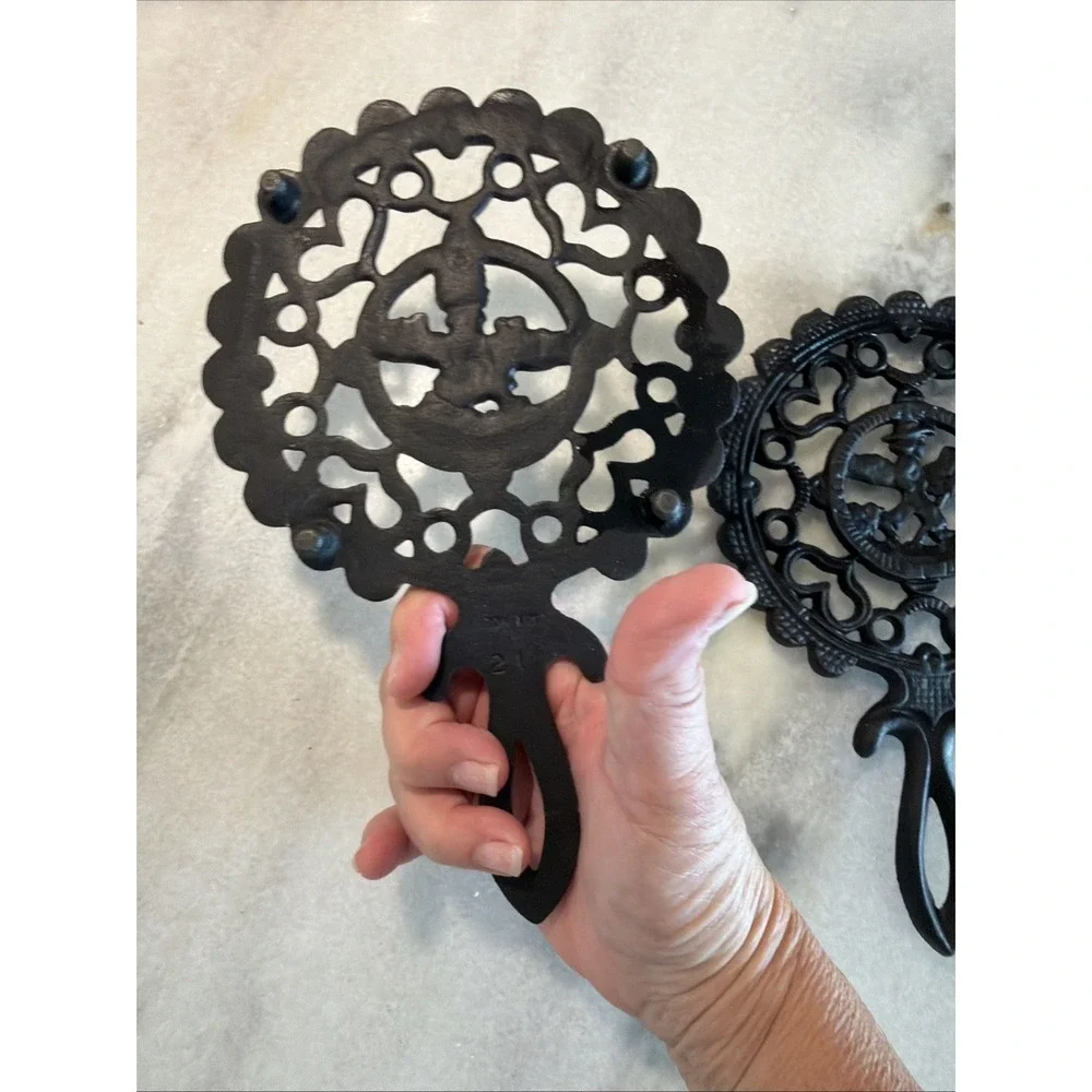 Set Of 2 Vintage Cast Iron Trivets Amish Boy And Girl OLA000